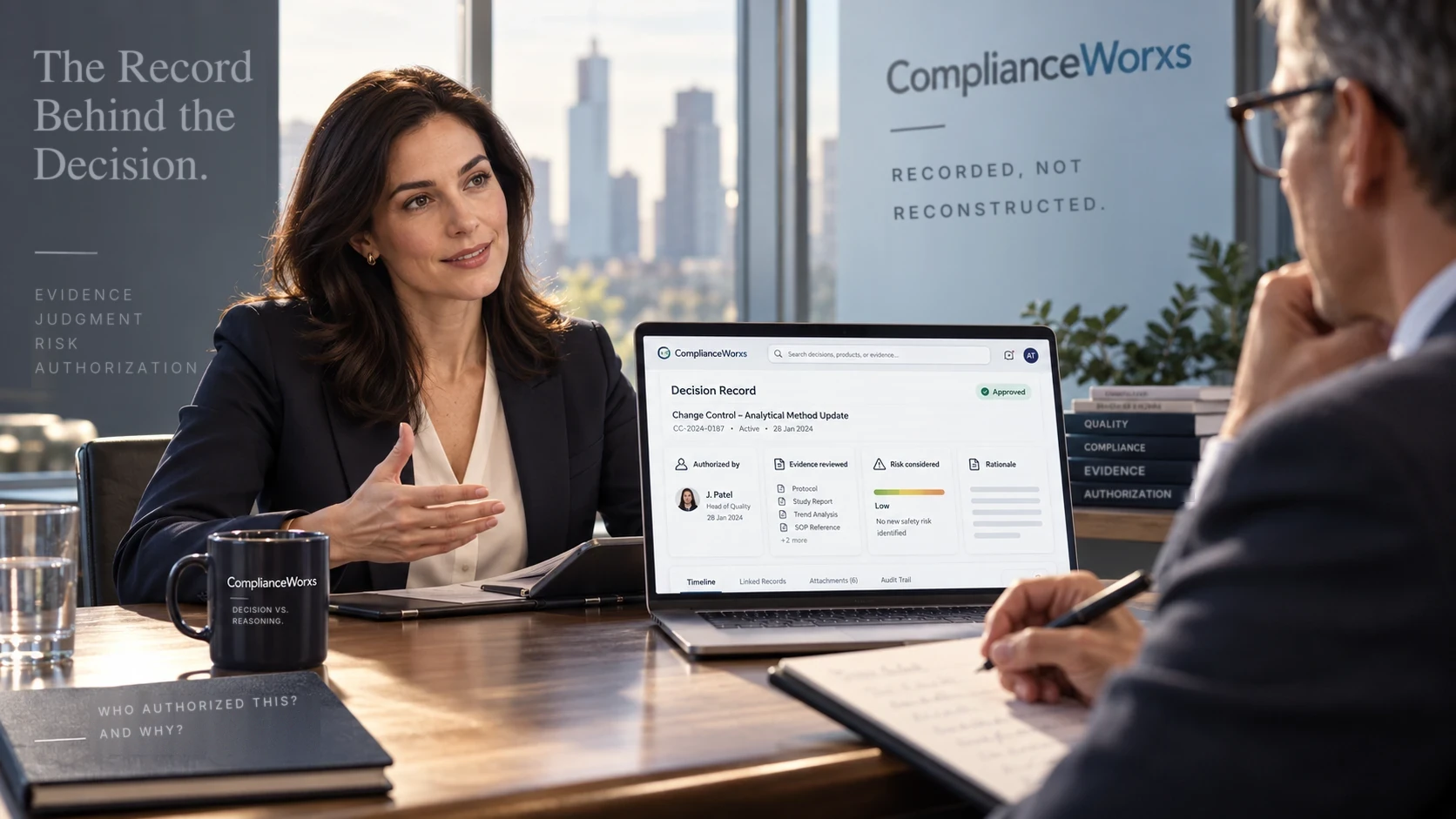 A Quality leader walks a reviewer through an approved decision record on a laptop: who authorized it, the evidence reviewed, and the risk considered.